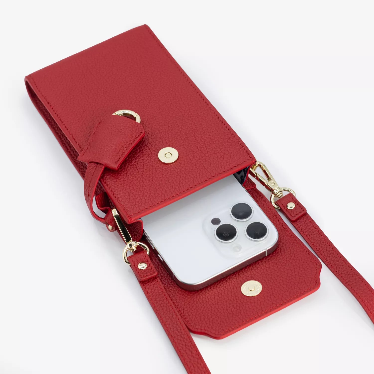 Boreal Bolso Cruzado Compacto en cuero Rojo de Urzus, vista interior con celular — diseñado para llevar billetera y tarjetero con seguridad.